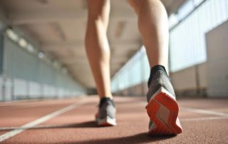 person exercising on track